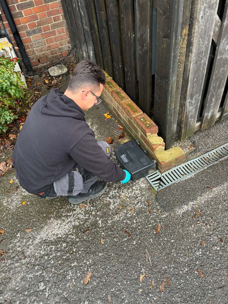 R&A Services technician inspecting a commercial property