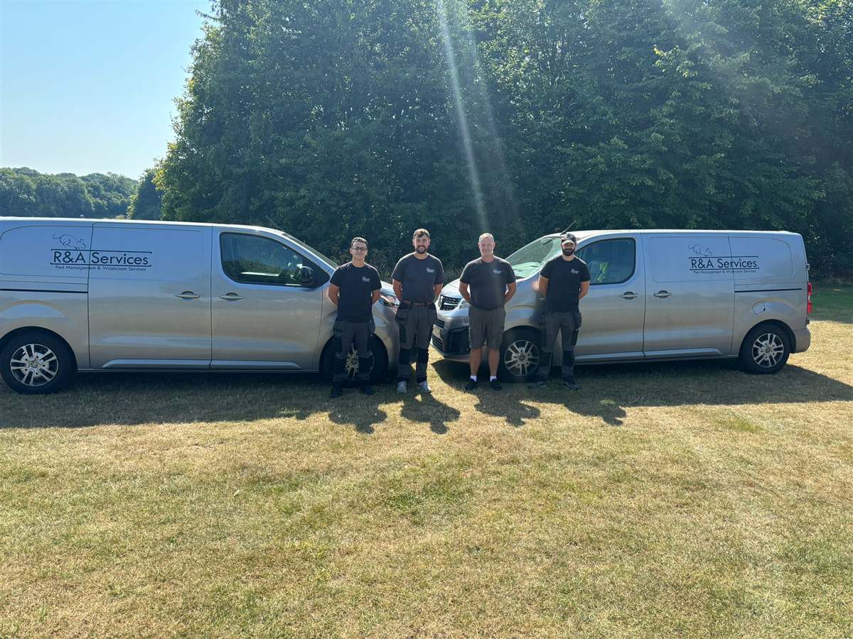 The R&A Services team and vans